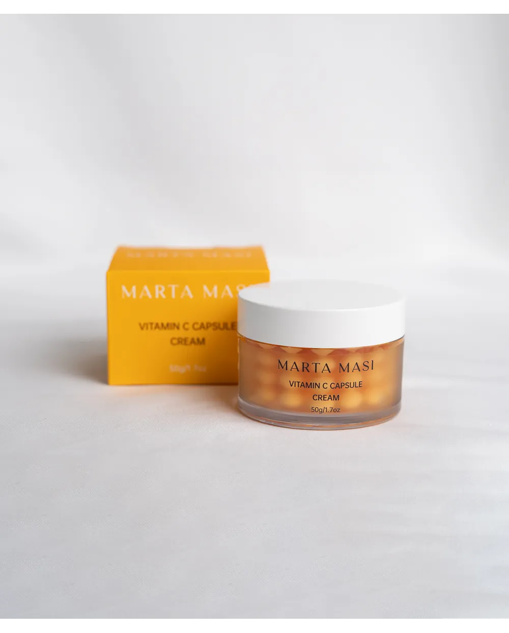 Caja y bote Marta Masi Crema Facial Iluminadora con Vitamina C y Niacinamida